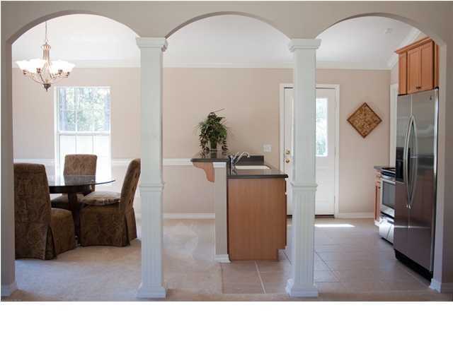 30 4th Street Santa Rosa Beach, FL 32459 - Photo 9 of 23 a living room with furniture and a flat screen tv