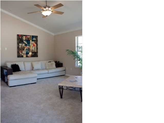 30 4th Street Santa Rosa Beach, FL 32459 - Photo 10 of 23 a living room with furniture and a wall painting