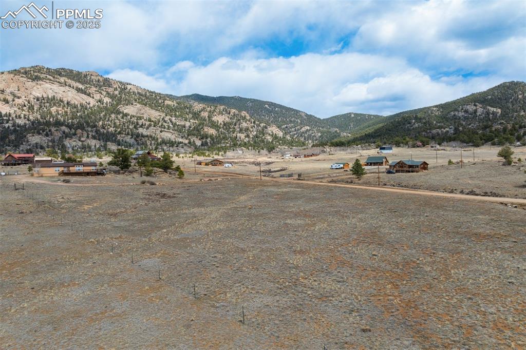 0 Tiara Road Lake George, CO 80827 - Photo 4 of 17 a view of a road with mountains in the background