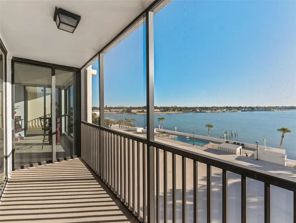 a balcony view with a ocean view