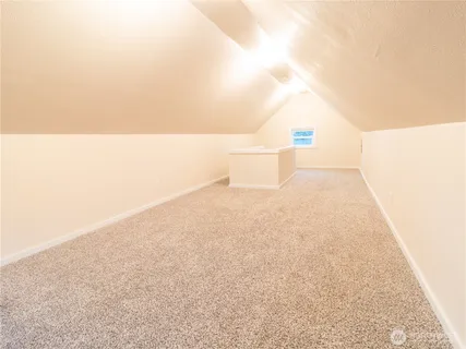 a view of a living room and bathroom