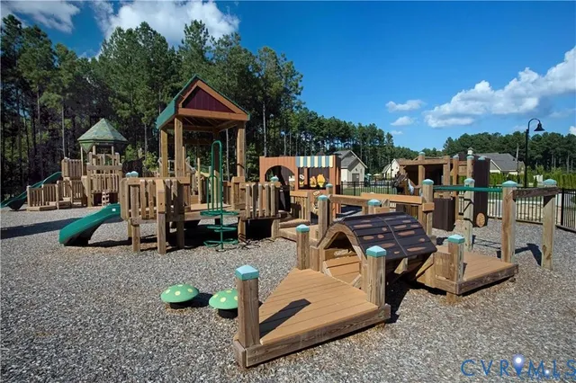 a view of a backyard with sitting area