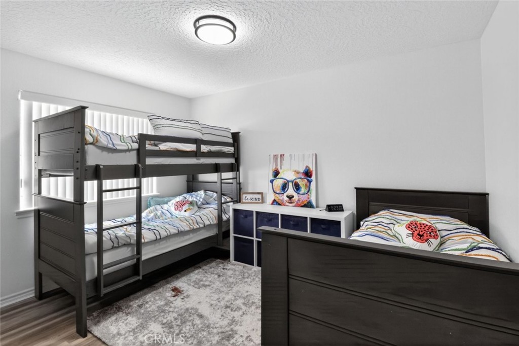 26502 Bluewater Road Helendale, CA 92342 - Photo 18 of 30 a bedroom with a bed and dresser