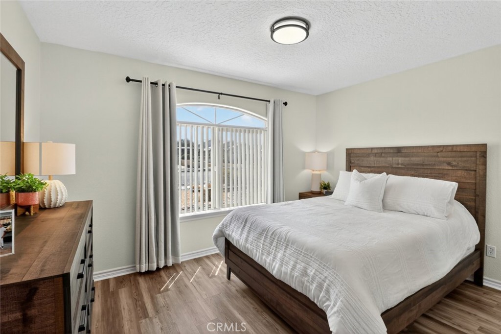 26502 Bluewater Road Helendale, CA 92342 - Photo 24 of 30 a bedroom with a bed and a window