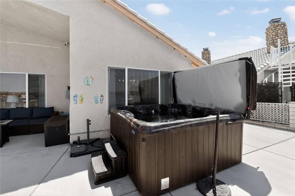 26502 Bluewater Road Helendale, CA 92342 - Photo 30 of 30 a kitchen with stainless steel appliances granite countertop a sink and a refrigerator