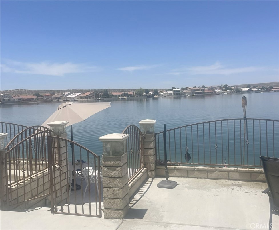 26502 Bluewater Road Helendale, CA 92342 - Photo 5 of 30 a view of a swimming pool with a terrace