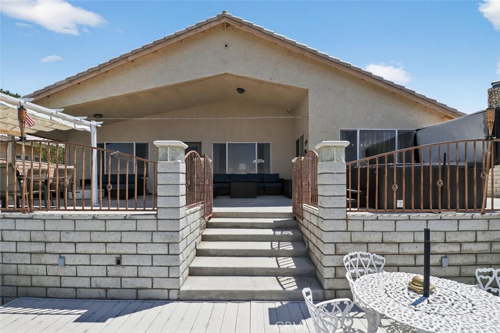 26502 Bluewater Road Helendale, CA 92342 - Photo 7 of 30 a front view of a house with large windows