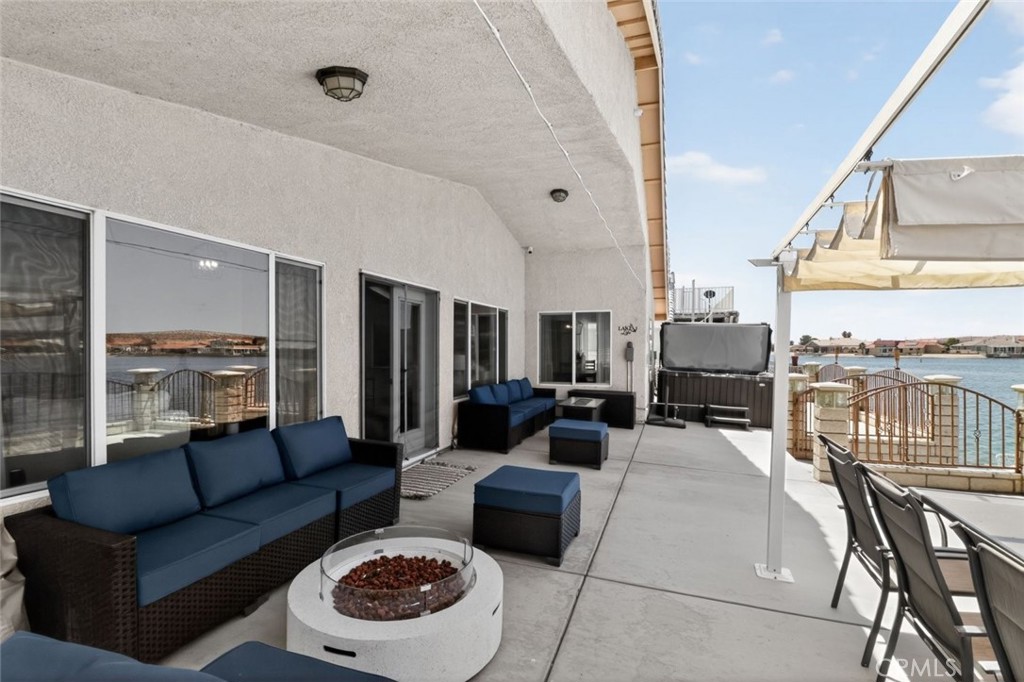 26502 Bluewater Road Helendale, CA 92342 - Photo 8 of 30 a living room with furniture and a view of kitchen