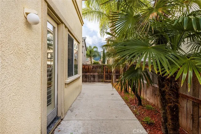 a bathroom with a sink a mirror and a toilet