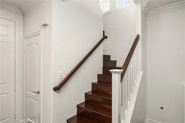 a view of a street with a building in the background