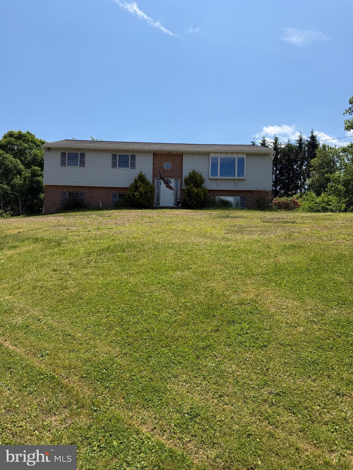 a view of house with outdoor space