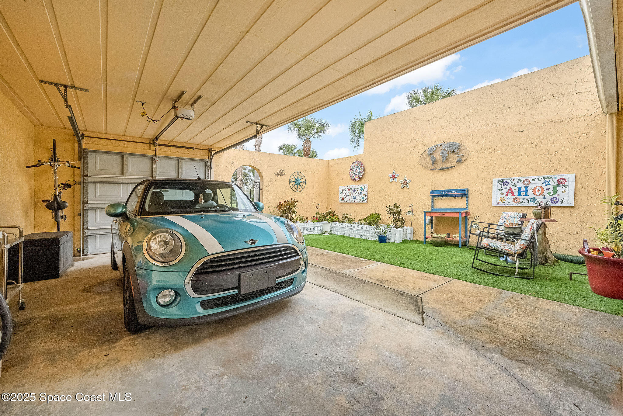 3546 Dairy Road Titusville, FL 32796 - Photo 4 of 18 Garage Courtyard
