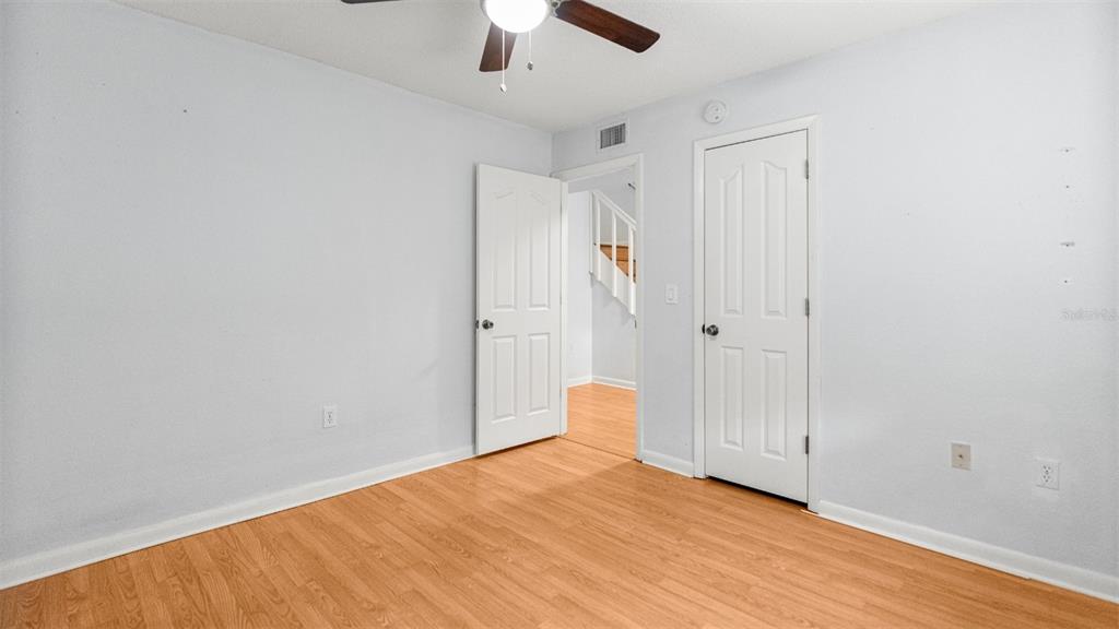 501 Southwest 75th Street, Unit B5 Gainesville, FL 32607 - Photo 26 of 38 wooden floor in an empty room