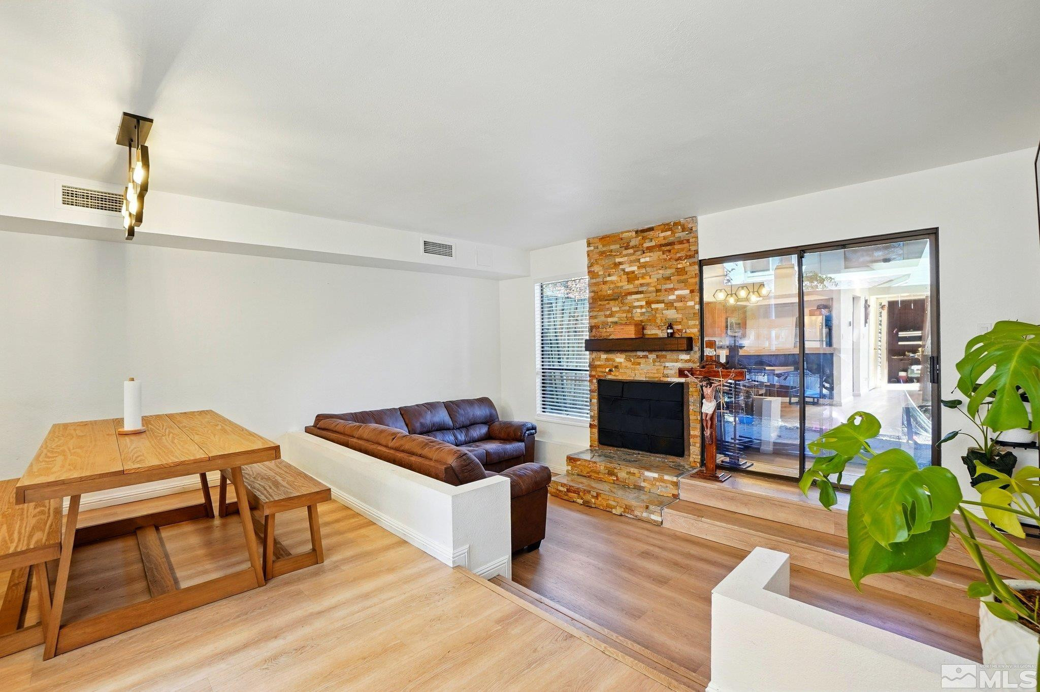 4185 Baker Lane Reno, NV 89509 - Photo 5 of 21 a living room with furniture and a fireplace