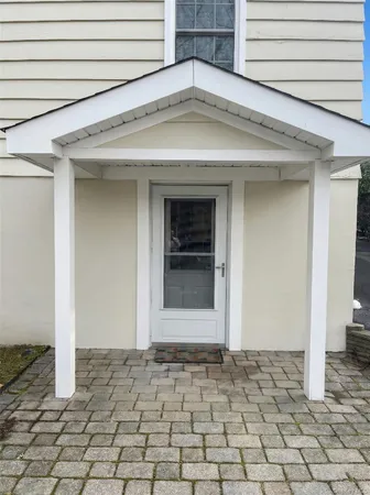 a view of entrance front of house