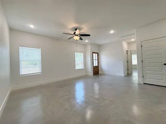 a view of a kitchen with a sink