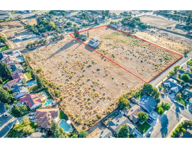 an aerial view of beach and residential houses