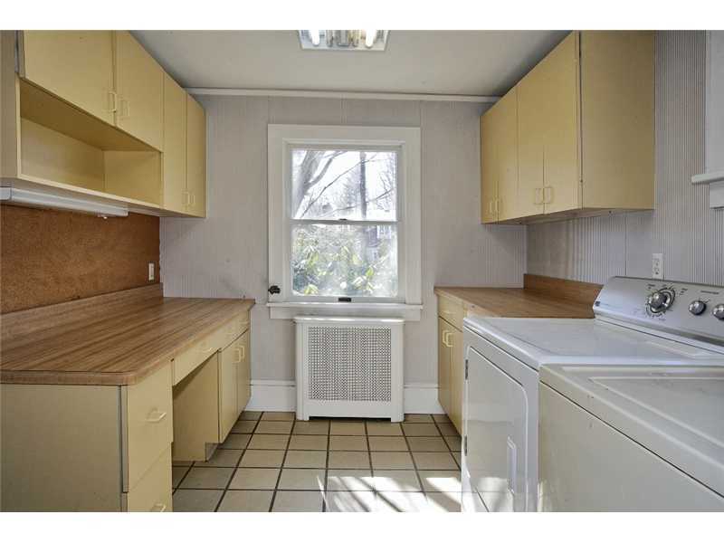117 Marshall Ridge Road New Canaan, CT 06840 - Photo 11 of 20 a utility room with a sink a cabinetry and a sink