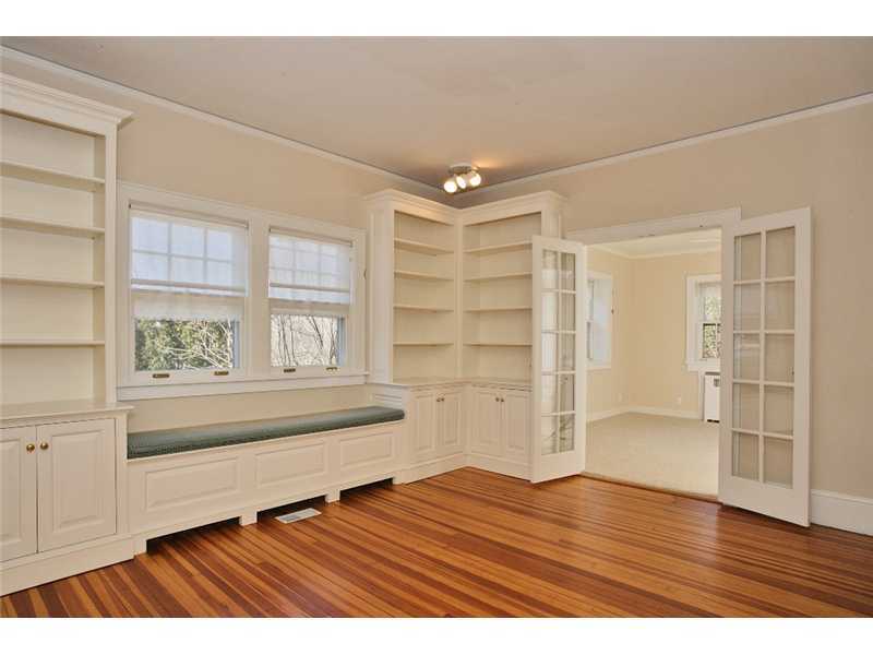117 Marshall Ridge Road New Canaan, CT 06840 - Photo 13 of 20 a view of empty room with wooden floor and cabinet