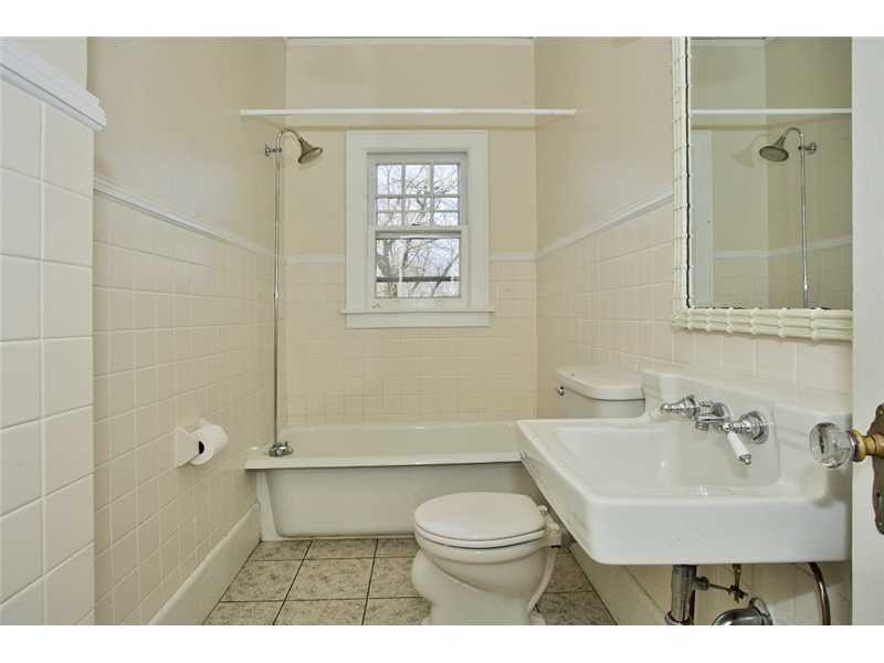 117 Marshall Ridge Road New Canaan, CT 06840 - Photo 14 of 20 a bathroom with a sink toilet and shower