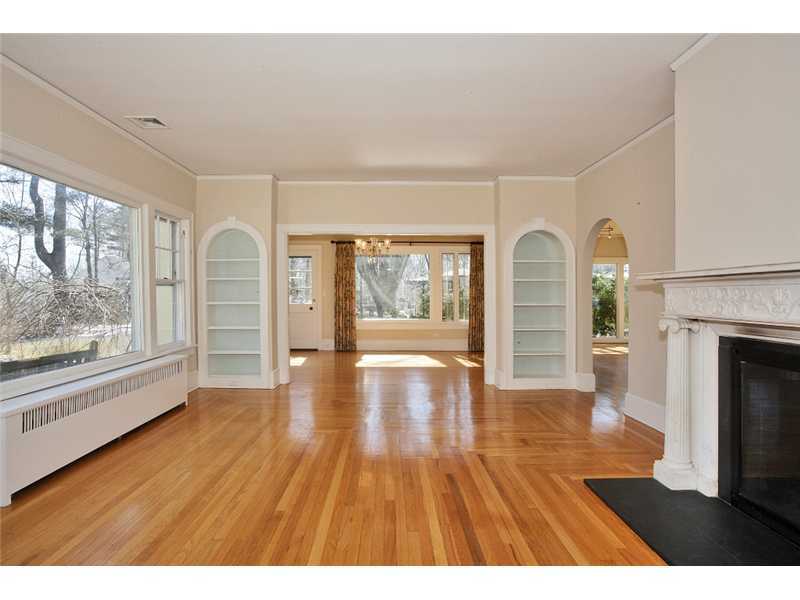 117 Marshall Ridge Road New Canaan, CT 06840 - Photo 7 of 20 a view interior of a house with wooden floor fireplace and windows