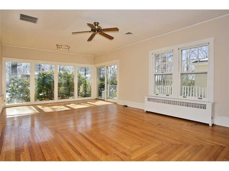 117 Marshall Ridge Road New Canaan, CT 06840 - Photo 9 of 20 a view of an empty room with a window and wooden floor