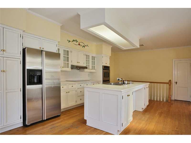 117 Marshall Ridge Road New Canaan, CT 06840 - Photo 10 of 20 a kitchen with stainless steel appliances a refrigerator sink and cabinets