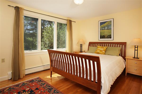 124 South Great Road Lincoln, MA 01773 - Photo 13 of 17 a bedroom with a bed and a window