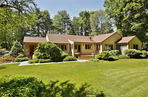 124 South Great Road Lincoln, MA 01773 - Photo 5 of 17 a front view of a house with a yard