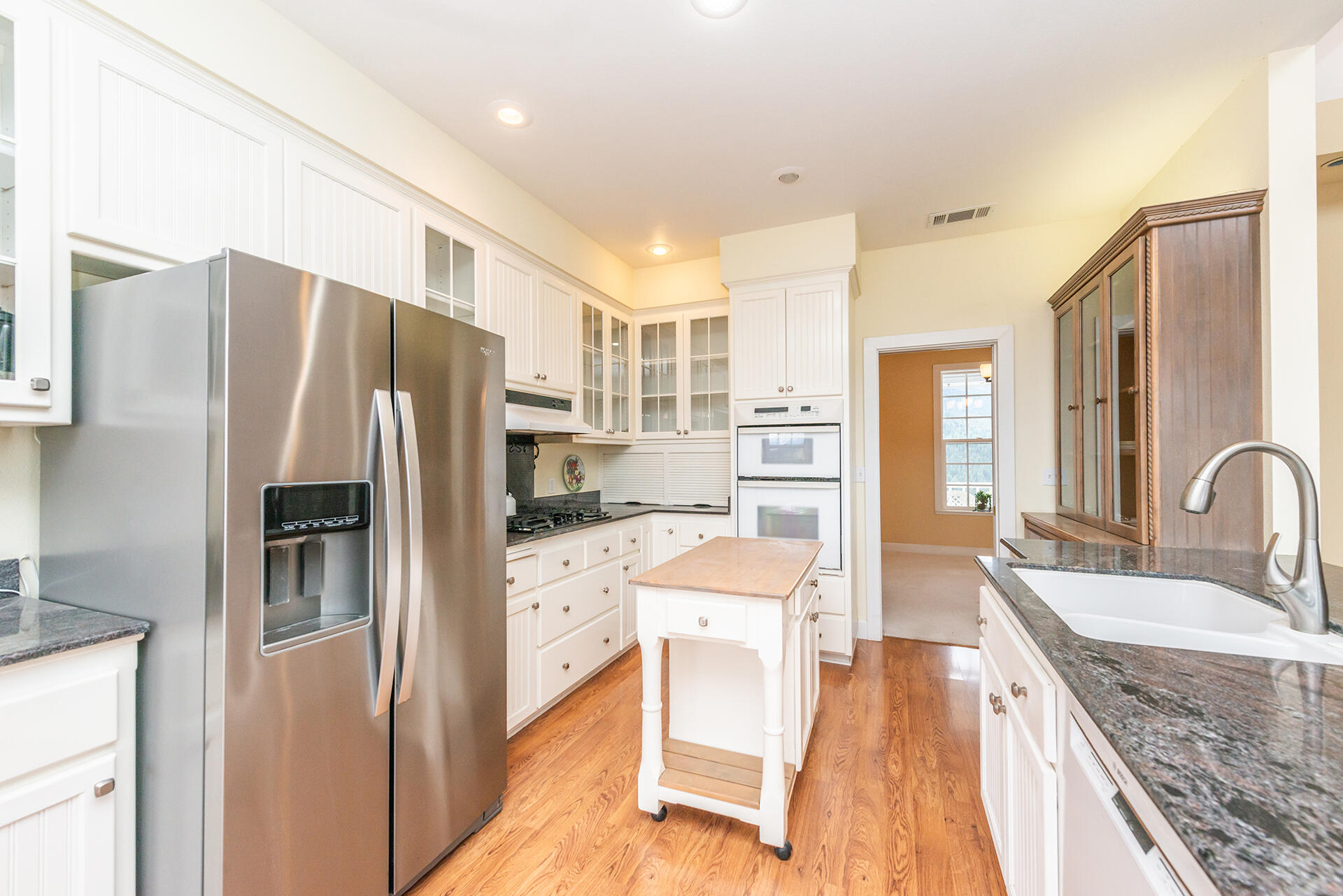1551 Oak Ranch Road Lewiston, CA 96052 - Photo 26 of 35 a kitchen with stainless steel appliances granite countertop a refrigerator and a sink