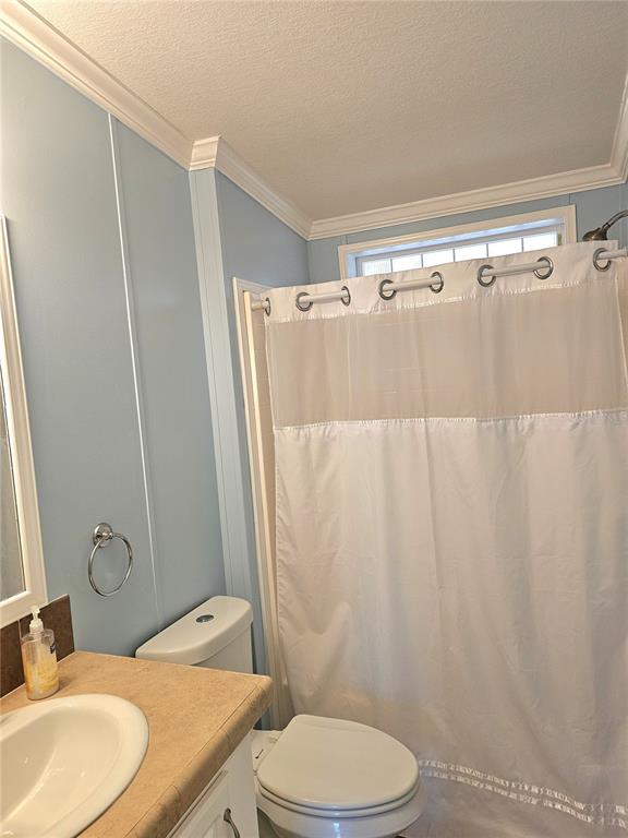 27 Freeman Avenue Punta Gorda, FL 33950 - Photo 14 of 32 a bathroom with a sink toilet and shower