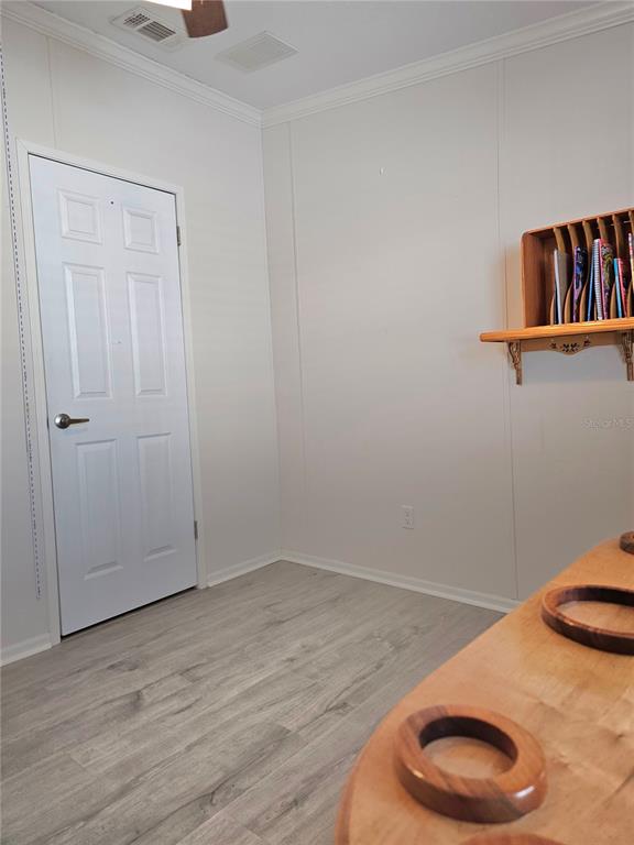 27 Freeman Avenue Punta Gorda, FL 33950 - Photo 15 of 32 a view of a room with wooden floor
