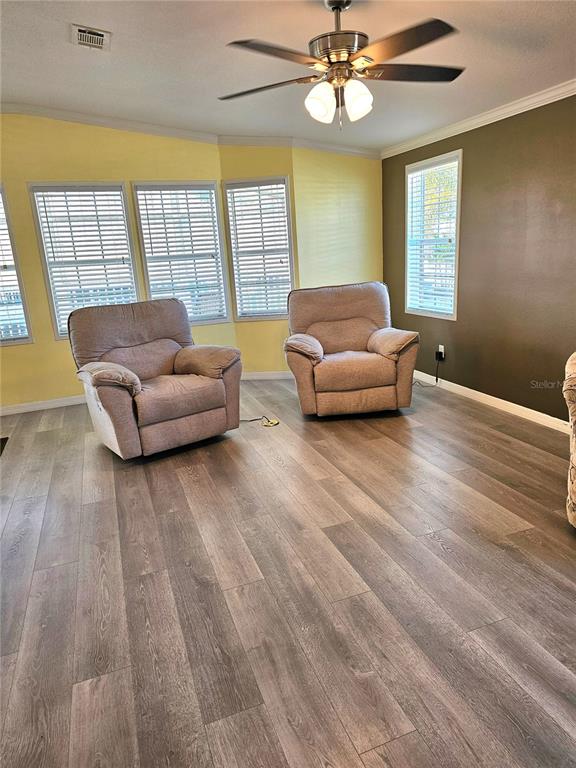 27 Freeman Avenue Punta Gorda, FL 33950 - Photo 9 of 32 a living room with furniture and a large window