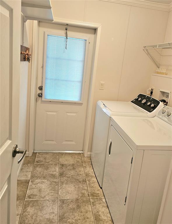 27 Freeman Avenue Punta Gorda, FL 33950 - Photo 10 of 32 a bathroom with a sink a vanity and a shower