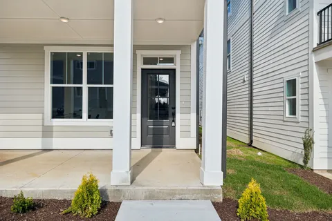 a view of entrance of house and yard