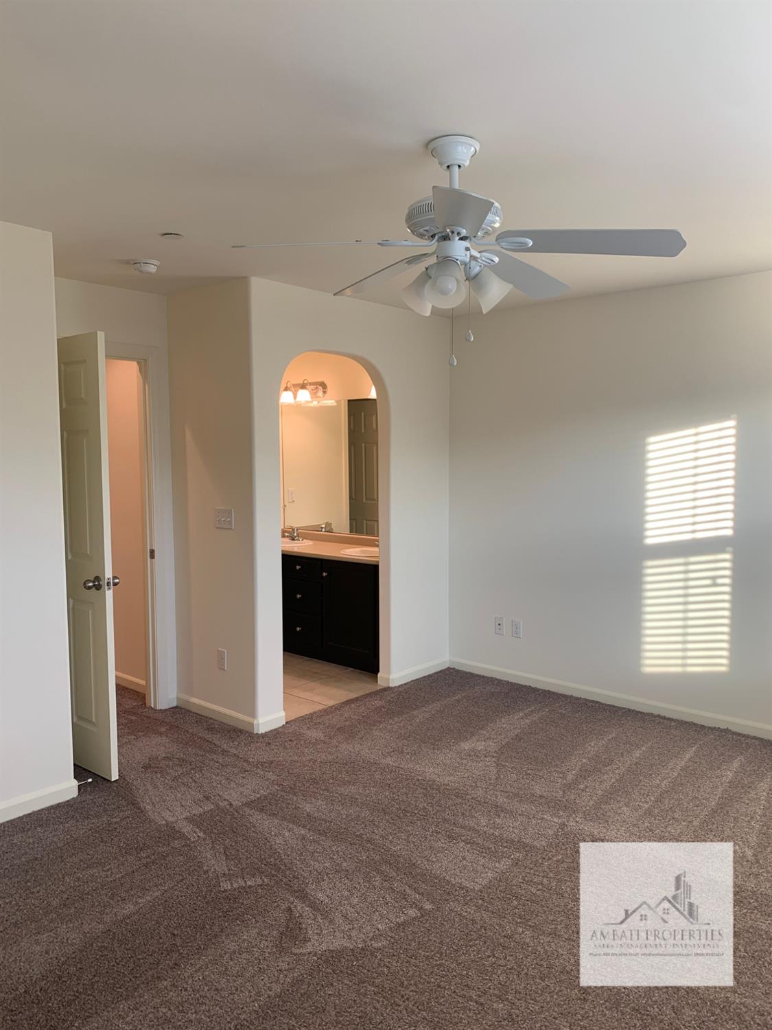 3663 Etchings Way Clovis, CA 93619 - Photo 18 of 26 a view of an empty room with a window