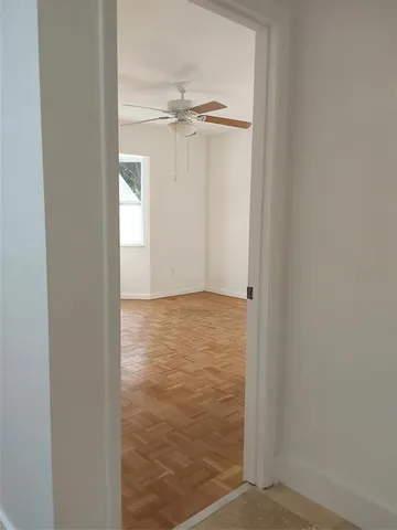 a view of a room with rack on the wall