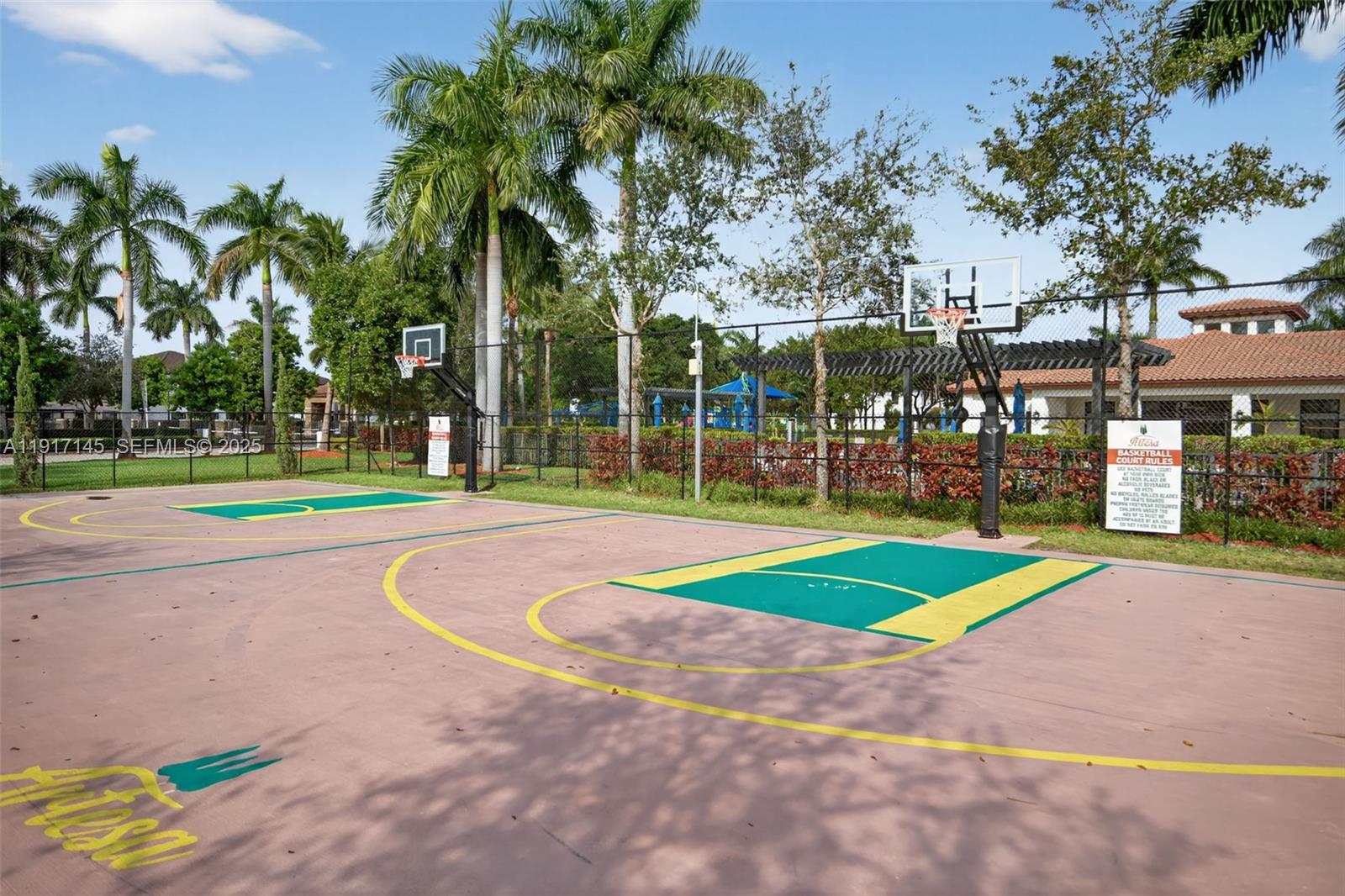 11527 Southwest 248th Lane Homestead, FL 33032 - Photo 44 of 44 a view of a playground with basketball court