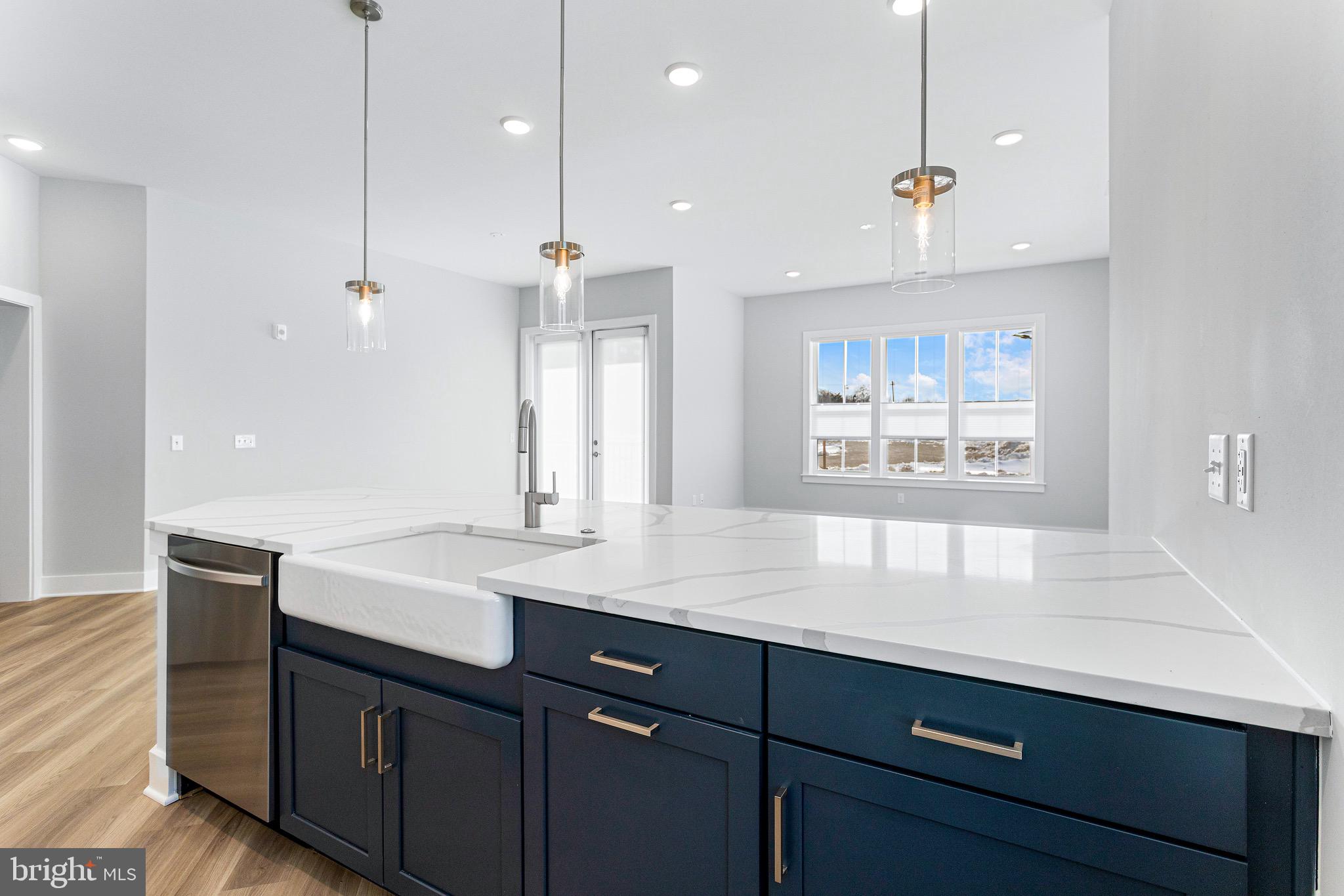 76 Old Mill Bottom Road North, Unit 102 Annapolis, MD 21409 - Photo 22 of 42 a bathroom with a sink a large mirror and a shower
