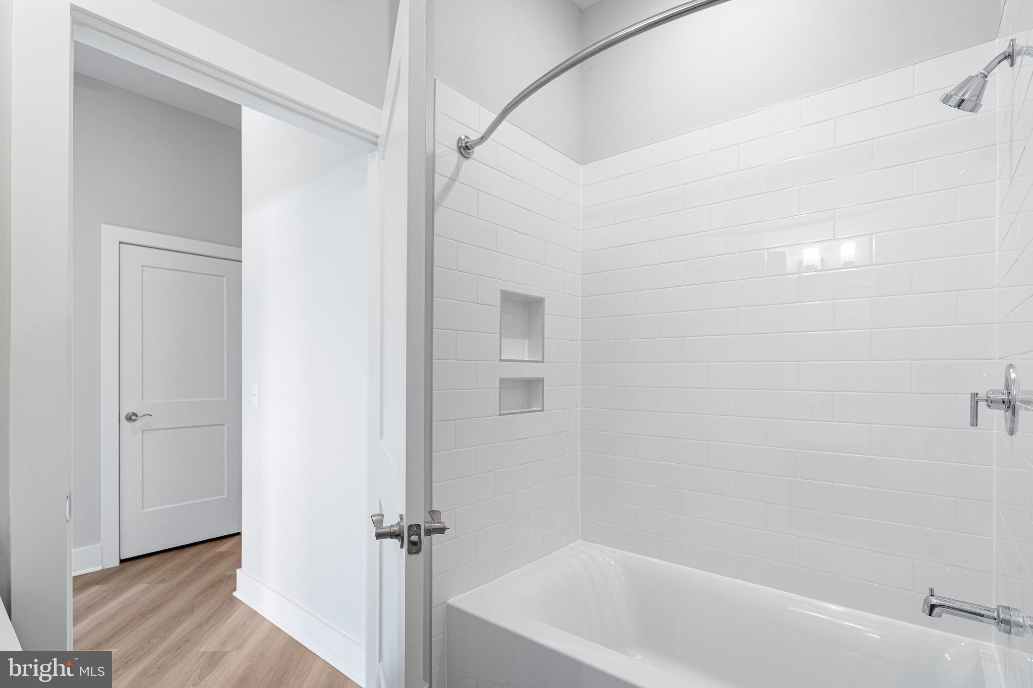 76 Old Mill Bottom Road North, Unit 102 Annapolis, MD 21409 - Photo 34 of 42 a bathroom with a bathtub