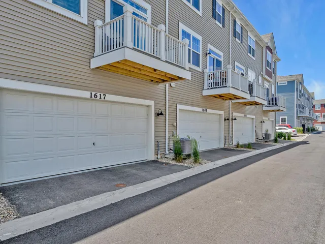 a front view of a building with a street