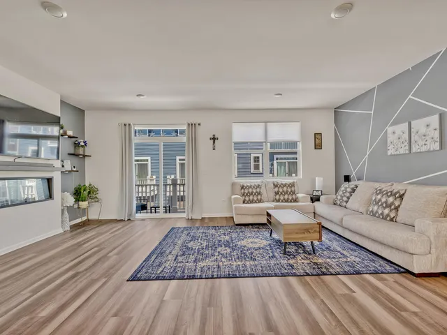 a living room with furniture and a couch