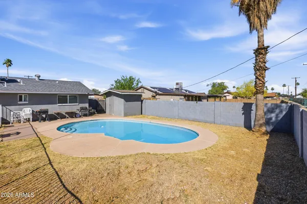 a view of a house with swimming pool