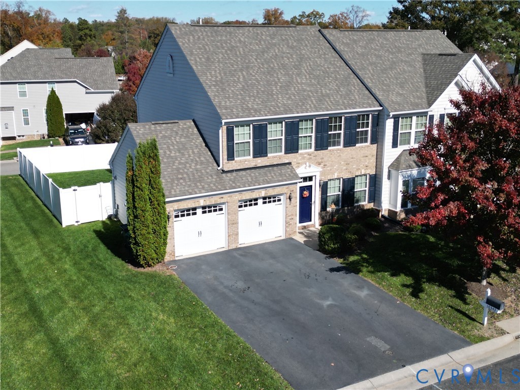 10343 Colony Bee Place Mechanicsville, VA 23116 - Photo 3 of 50 an aerial view of residential houses with yard and mountain view in back