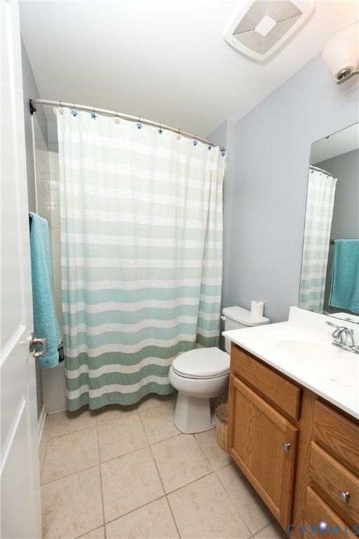 10343 Colony Bee Place Mechanicsville, VA 23116 - Photo 33 of 50 a bathroom with a sink a toilet and shower curtain