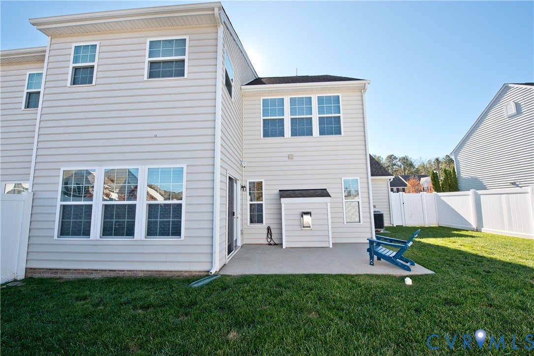 10343 Colony Bee Place Mechanicsville, VA 23116 - Photo 37 of 50 a view of house with backyard and a yard