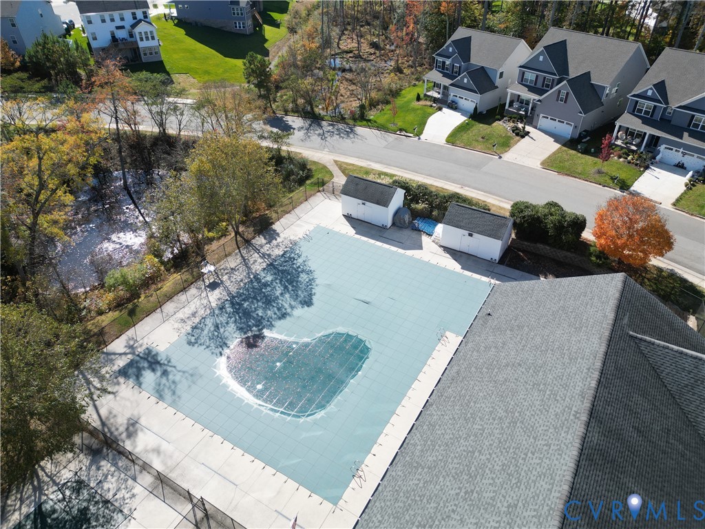 10343 Colony Bee Place Mechanicsville, VA 23116 - Photo 43 of 50 an aerial view of a house with a yard and lake view
