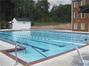 10343 Colony Bee Place Mechanicsville, VA 23116 - Photo 44 of 50 a view of swimming pool with a yard