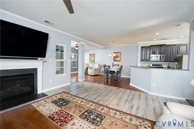 a kitchen with stainless steel appliances granite countertop a sink counter space and cabinets