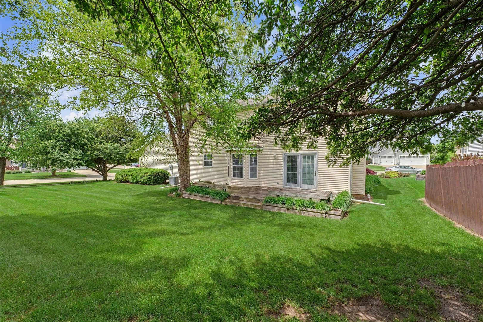 4409 Copper Ridge Road Champaign, IL 61822 - Photo 38 of 40 a view of a house with a yard